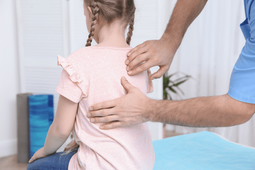 girl scoliosis check